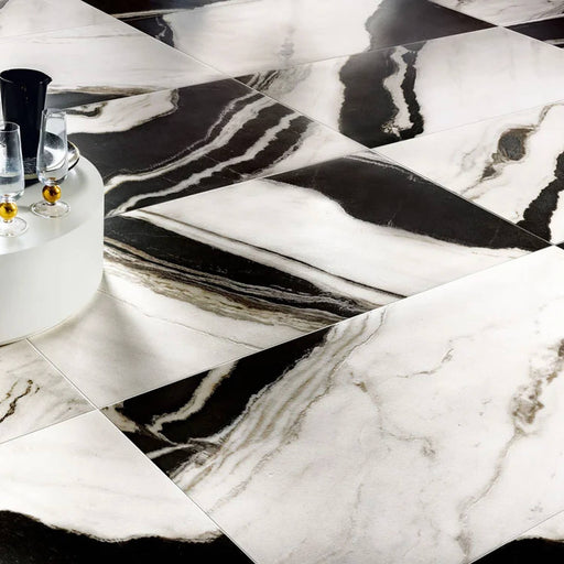 Edimax Symphony Snow 24x48 Ocean Deco matte porcelain tile with bold black and white veining in a geometric floor layout.