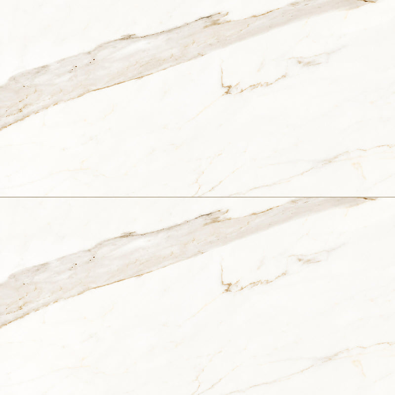 Two polished Gold Calacatta porcelain tiles, each 12x24 inches, with warm ivory surfaces and subtle gold veining.
