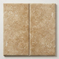 English Walnut Travertine Paver - Unfilled, Honed Beveled, 12x24 close-up