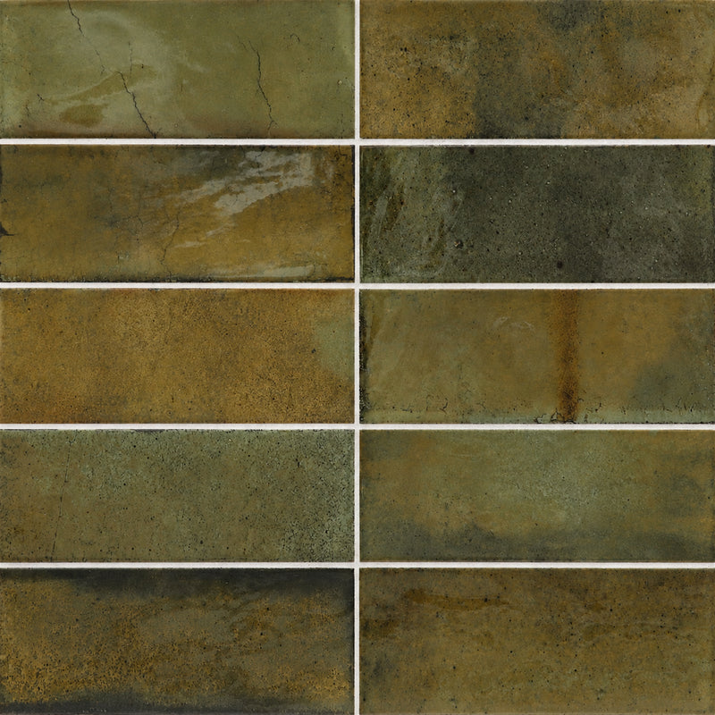 Equipe Hanoi Wild Olive 2x6 glossy ceramic tiles with varied olive-green and earthy brown tones in a stacked layout.