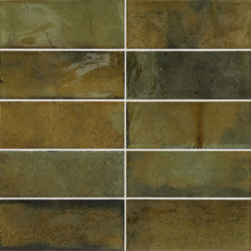 Equipe Hanoi Wild Olive 2x6 glossy ceramic tiles with varied olive-green and earthy brown tones in a stacked layout.