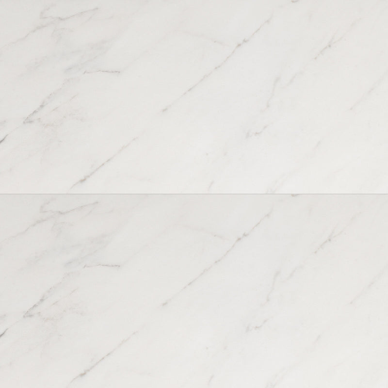 Evoque Series Blanco Brillo 15x30 polished porcelain tiles with a white stone-look surface and subtle gray veining.