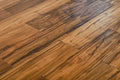Ex. Walnut / Acacia Exotic Walnut Golden 4-3/4xRL (12-48) Hand-Scraped Urethane Walnut Wood Flooring