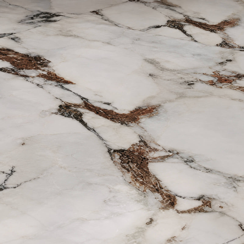 Close-up of Florim Program Bijoux Breche Capraia glossy porcelain slab flooring with white mineral patterns and brown and gray veins.