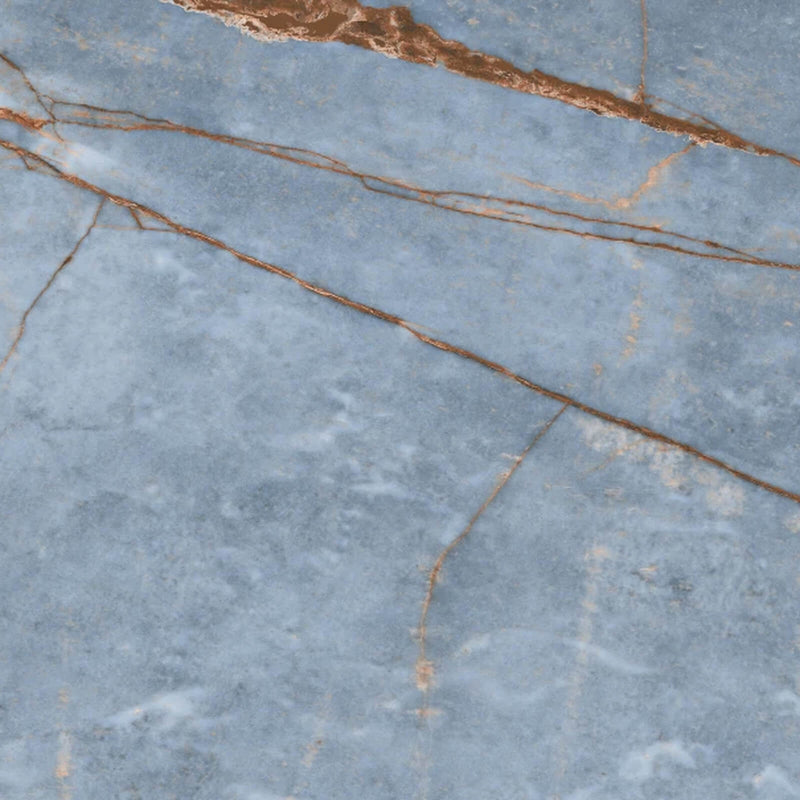 Close-up of Florim Heritage Azure glossy porcelain slab with pale blue tones and copper-brown veining.