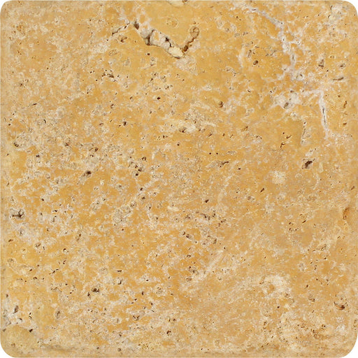 Golden Sienna tumbled travertine tile with warm golden color, natural pits, and softly rounded edges.