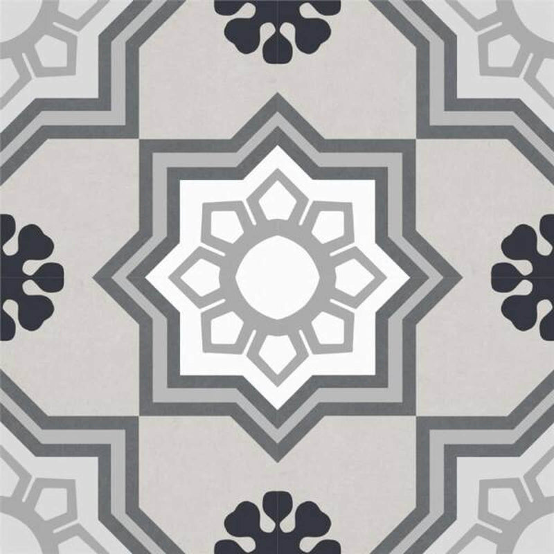 Gracia 7.9x7.9 matte ceramic tile with gray and white geometric patterns and black floral accents on a beige background.
