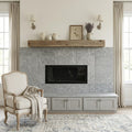 Graphite Antique Chiseled 12x24 Limestone Tile — Living Room fireplace surround