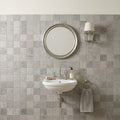 Graphite Antiqued 2x2 Limestone Mosaic — Powder Room wall