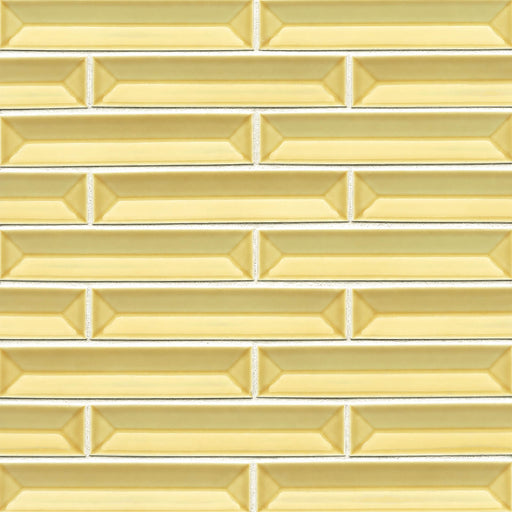 Half Baked Butter Me Up glass mosaic with buttery yellow beveled 1-1/4x6 tiles in a staggered brick pattern on 13x11.5 mesh.
