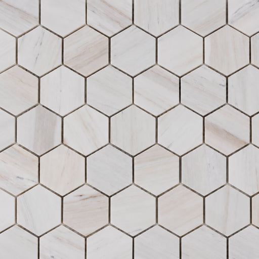 Hexagon Wooden White 2x2 honed marble mosaic featuring white and ivory hexagonal tiles with subtle beige and grey wood-like veining and a smooth matte finish.
