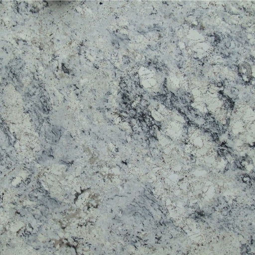 Ice White granite slab with a light gray base and dark mineral patterns.