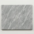 Icelandic Blue Sky 16x24x2 Tumbled Marble Single Bullnose Pool Coping close-up