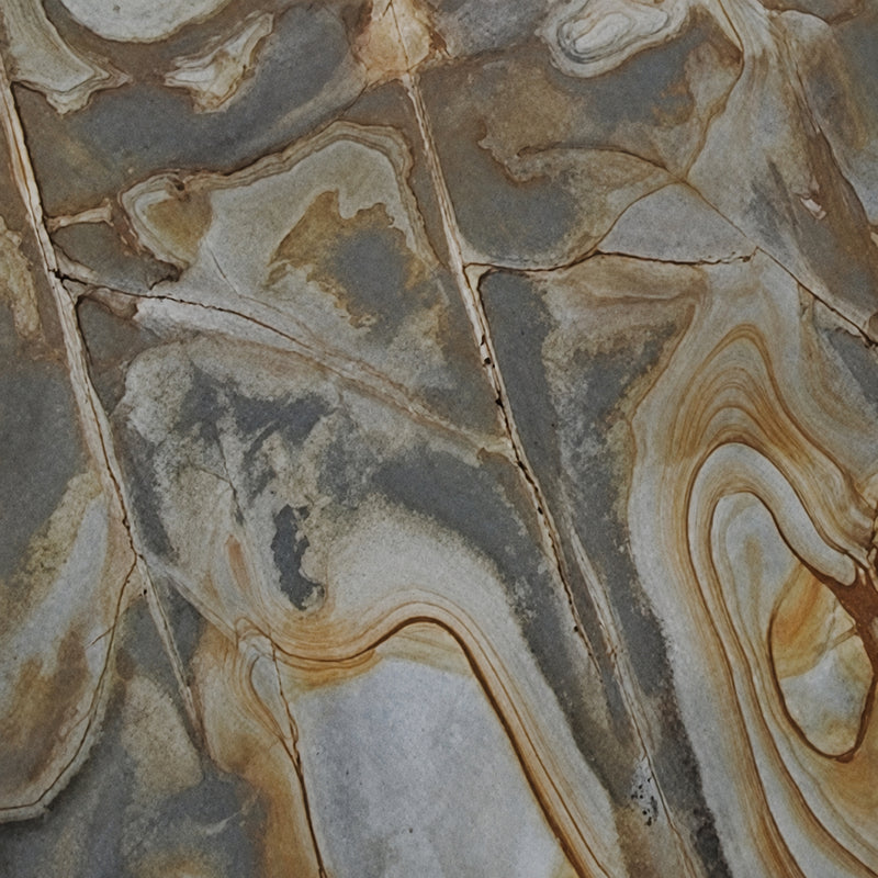 Illusion Blue 2cm polished quartzite slab detail with blue-gray and golden flowing veins.