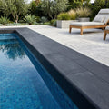 Indian Black Limestone Tumbled & Brushed 12 x 24 x 1.25 Bullnose Coping 12x24 pool coping — Swimming Pool remodel pool edge