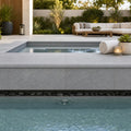 Indian Black Limestone Tumbled & Brushed 16 x 24 x 2 Bullnose Coping 16x24 pool coping — Spa spa overhang edge