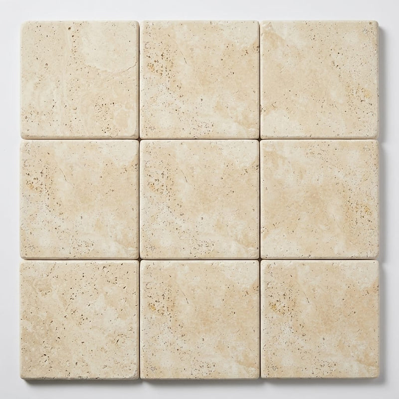 Ivory Beige Travertine Coping 12x12 Tumbled Bullnose 2 inch close-up