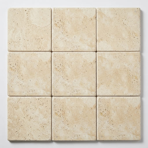 Ivory Beige Travertine Coping 12x12 Tumbled Bullnose 2 inch close-up