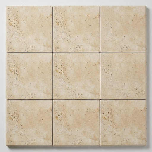 Ivory Beige Travertine Coping 12x12 Unfilled, Honed Bullnose 2 inch close-up