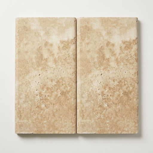 Ivory Beige Travertine Coping 12x24 Tumbled Bullnose 1.25 inch close-up