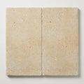 Ivory Beige Travertine Coping 12x24 Tumbled Bullnose 2 inch close-up