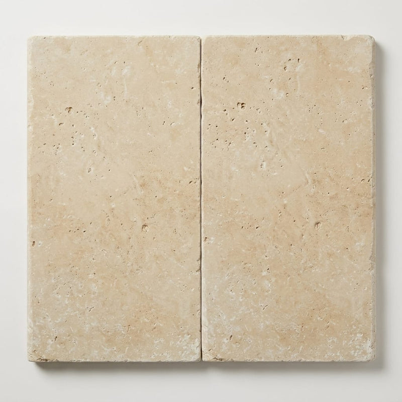 Ivory Beige Travertine Coping 12x24 Tumbled Bullnose 2 inch close-up