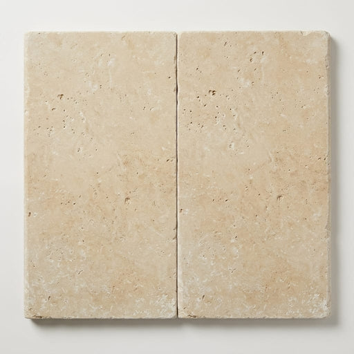 Ivory Beige Travertine Coping 12x24 Tumbled Bullnose 2 inch close-up