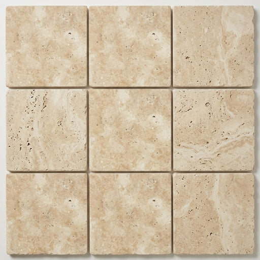 Ivory Beige Travertine Paver 12x12 Unfilled Chiseled 1.25 inch close-up