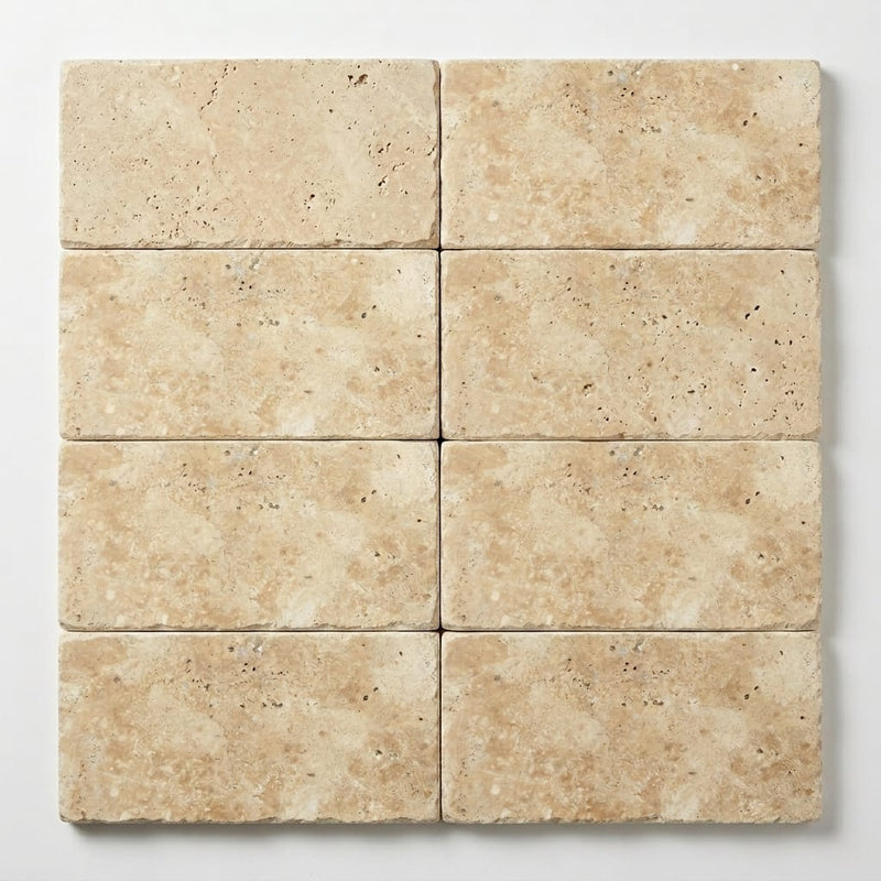 Ivory Beige Travertine Paver 6x12 Unfilled Chiseled 1.25 inch close-up