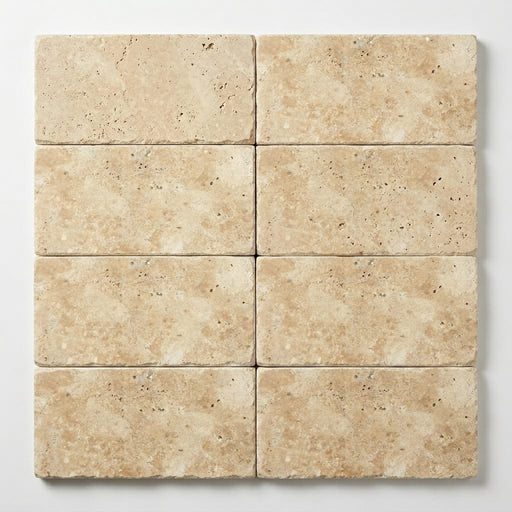 Ivory Beige Travertine Paver 6x12 Unfilled Chiseled 1.25 inch close-up