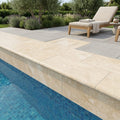 Ivory Cordoba Cream Travertine Tumbled 12 x 24 x 1.25 Bullnose Coping 12x24 pool coping — Swimming Pool remodel pool edge