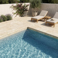 Ivory Cordoba Cream Travertine Tumbled 12 x 24 x 1.25 Double Bullnose Coping 12x24 pool coping — Swimming Pool pool edge drop-face coping