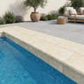 Ivory Cordoba Cream Travertine Tumbled 12 x 24 x 1.25 Double Bullnose Coping 12x24 pool coping — Swimming Pool remodel pool edge