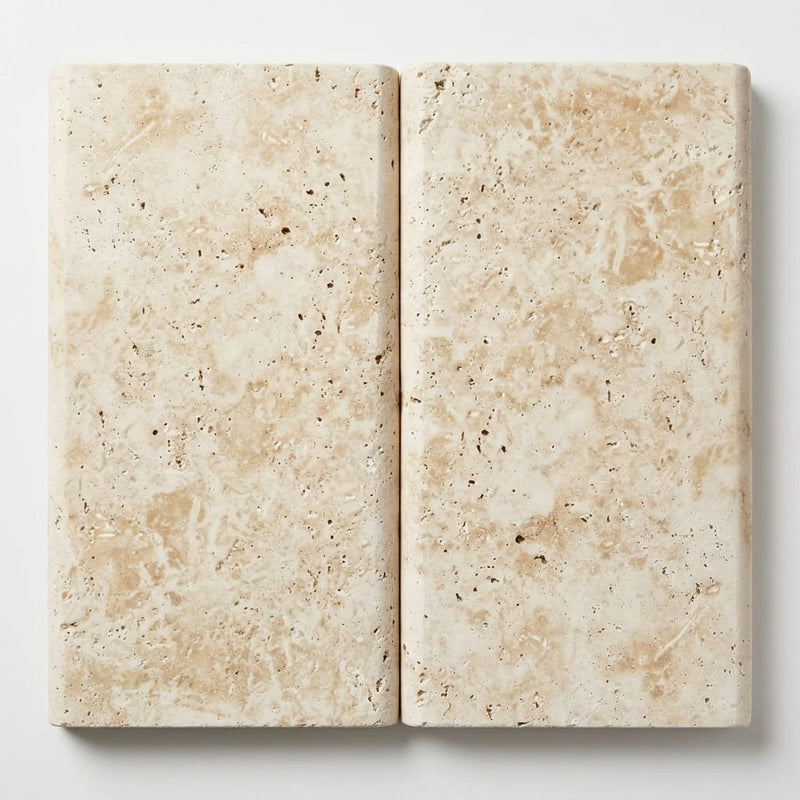 Ivory Cordoba Cream Travertine Tumbled 12 x 24 x 2 Double Bullnose Coping 12x24 close-up