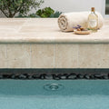 Ivory Cordoba Cream Travertine Tumbled 16 x 24 x 2 Double Bullnose Coping 16x24 pool coping — Spa spa overhang edge