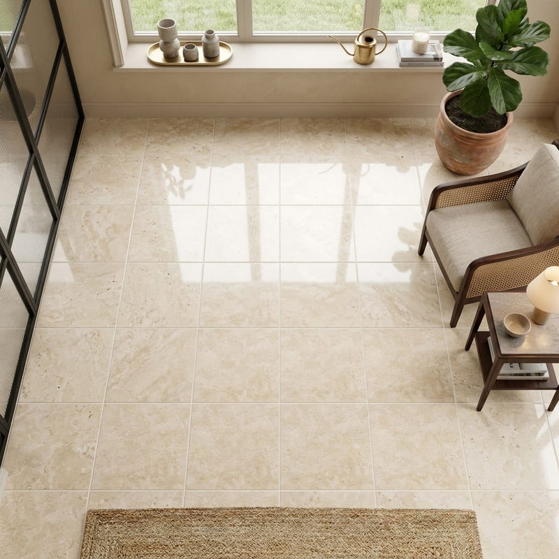 Ivory / Light Travertine 12x12 Cream Filled & Polished Tile — Sunroom floor