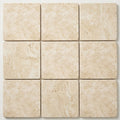 Ivory / Light Travertine 12x12 Cream Tumbled Tile close-up