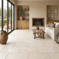 Ivory / Light Travertine 12x24 Cream Tumbled tile — Living Room floor