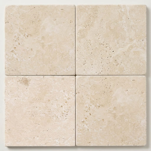 Ivory / Light Travertine 16x16 Cream Tumbled Tile close-up