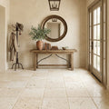 Ivory / Light Travertine 16x16 Cream Tumbled Tile — Foyer floor