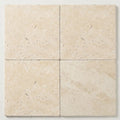 Ivory / Light Travertine 16x16 Cream Unfilled, Brushed & Chiseled Tile close-up