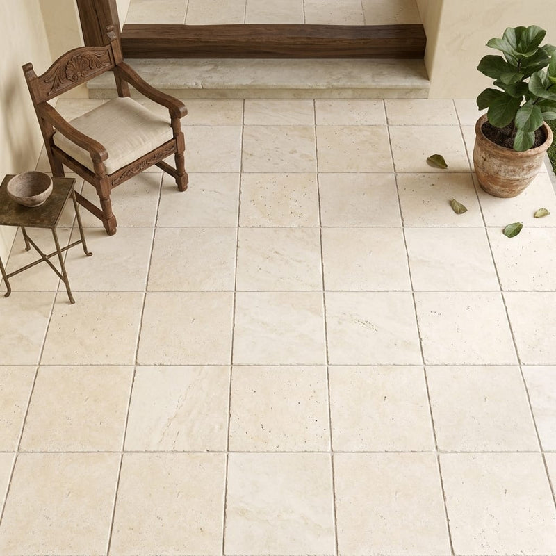 Ivory / Light Travertine 16x16 Cream Unfilled, Brushed & Chiseled Tile — Covered Patio floor