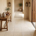 Ivory / Light Travertine 16x16 Cream Unfilled, Brushed & Chiseled Tile — Hallway floor