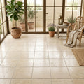 Ivory / Light Travertine 16x16 Cream Unfilled, Brushed & Chiseled Tile — Sunroom floor