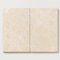 Ivory / Light Travertine 16x24 Cream Tumbled Paver close-up