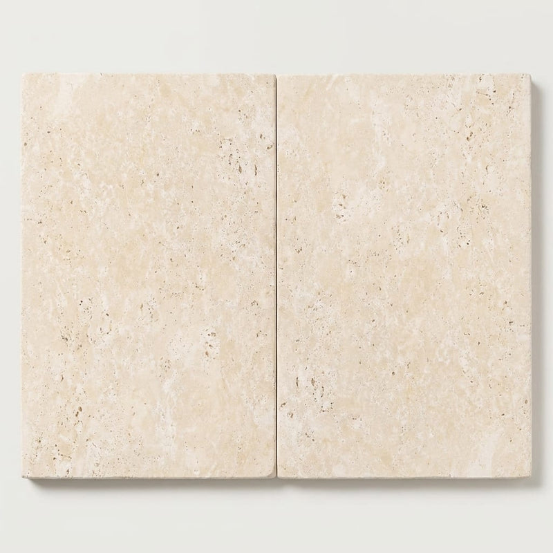 Ivory / Light Travertine 16x24 Cream Tumbled Paver close-up