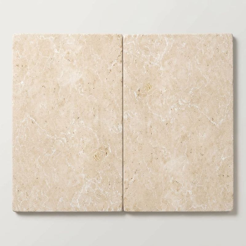 Ivory / Light Travertine 16x24 Cream Tumbled Tile close-up