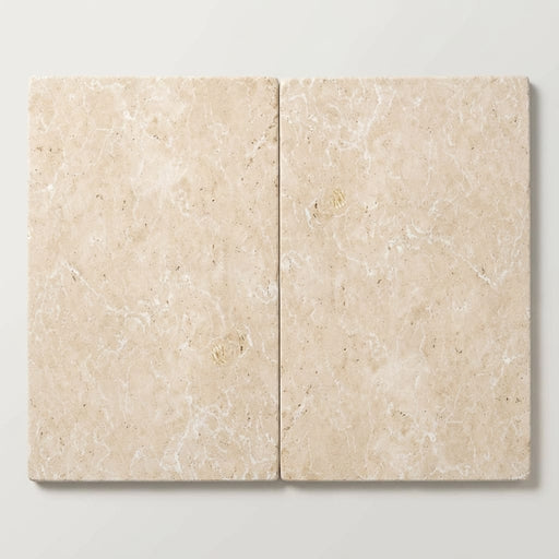 Ivory / Light Travertine 16x24 Cream Tumbled Tile close-up