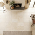 Ivory / Light Travertine 16x24 Cream Tumbled tile — Living Room floor