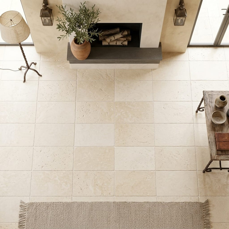 Ivory / Light Travertine 16x24 Cream Tumbled tile — Living Room floor